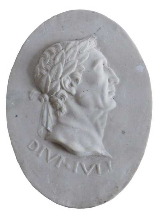 A Grand Tour style resin plaque of Julius Ceaser, marked Divi Ivli, of oval form, with raised...