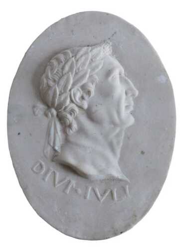 A Grand Tour style resin plaque of Julius Ceaser, marked Divi Ivli, of oval form, with raised...