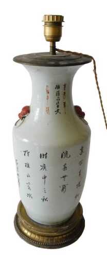 A 19thC Chinese porcelain famille rose vase, decorated with entwined flowering trees and birds,...
