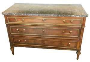 A French Empire mahogany commode, with black marble top, raised above three ormolu mounted...