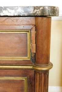A French Empire mahogany commode, with black marble top, raised above three ormolu mounted... - 2