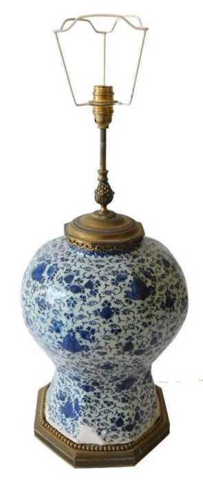 An 18thC Delft blue and white vase, of bellied circular form, profusely decorated with flowers,...