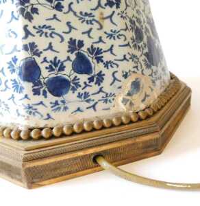 An 18thC Delft blue and white vase, of bellied circular form, profusely decorated with flowers,... - 3