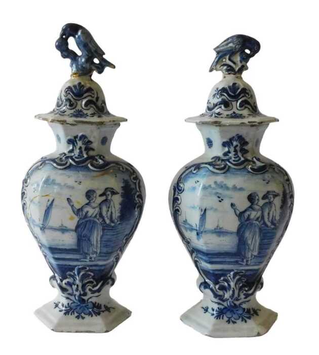 A pair of 19thC Dutch Delft blue and white vases, each of inverted hexagonal form, with bird and...
