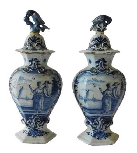 A pair of 19thC Dutch Delft blue and white vases, each of inverted hexagonal form, with bird and...