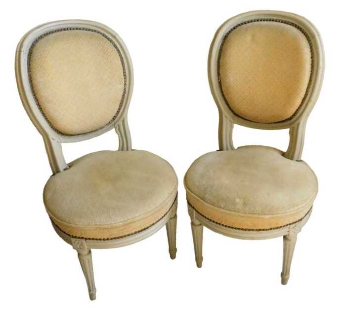 A pair of 19thC Louis XVI style grey painted chauffeuses, each with beaded backs and circular...