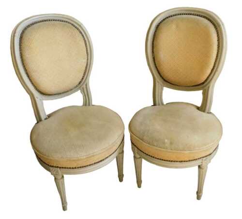 A pair of 19thC Louis XVI style grey painted chauffeuses, each with beaded backs and circular...