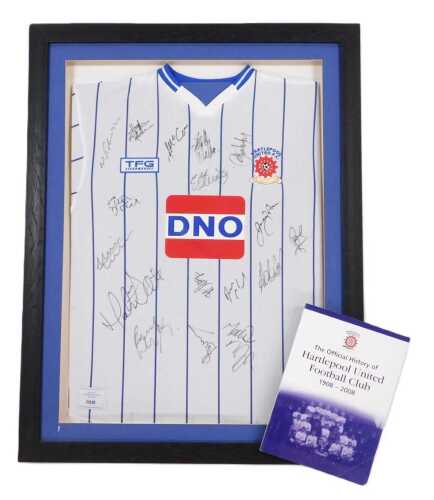 A Hartlepool United Football Club shirt, signed by various players, framed and glazed, together...
