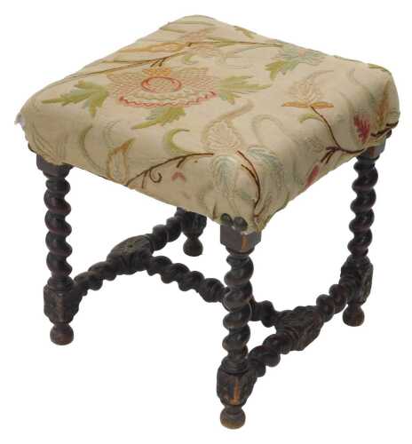 A 17thC style oak stool, the square top padded with floral fabric, on barley twist legs, joined...