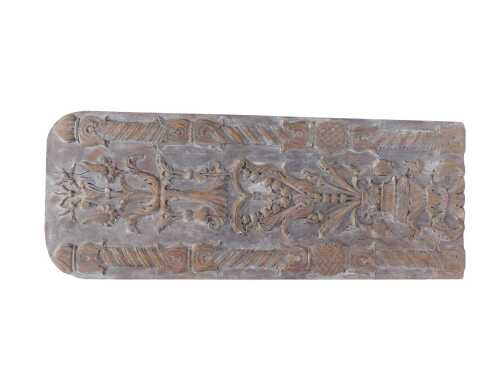 A heavily carved oak panel, of rectangular form, set with floral urns and surrounded by scrolls...