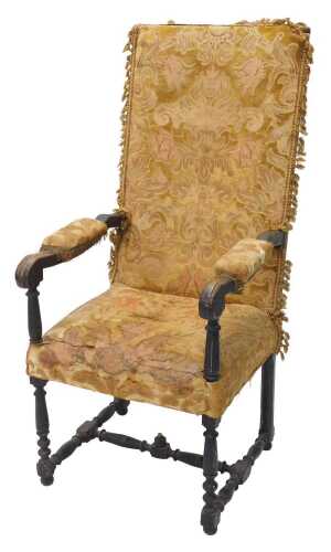 A 19thC ebonised oak throne chair, with rectangular back and shaped arms, with baluster arm...
