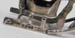 A 19thC miniature model of a figure in sleigh being pulled by a horse, with realistic reigns,... - 2
