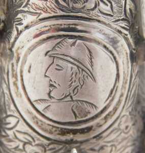A 19thC miniature model of a samovar, heavily chased with panels set with figures on scroll feet,... - 3