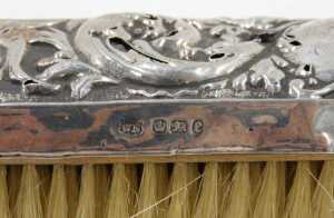 A Victorian harlequin silver five piece dressing table set, to include hairbrush repousse... - 10
