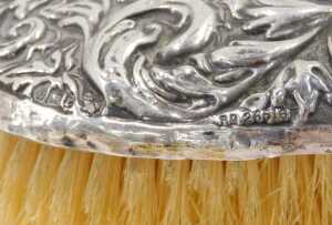 A Victorian harlequin silver five piece dressing table set, to include hairbrush repousse... - 14
