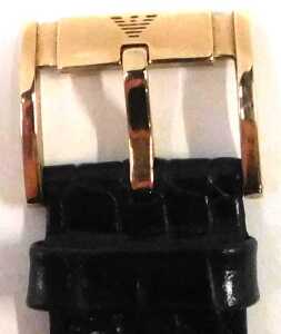 An Emporio Armani fashion watch, the 3cm wide rectangular face with gilt coloured baton pointers... - 3