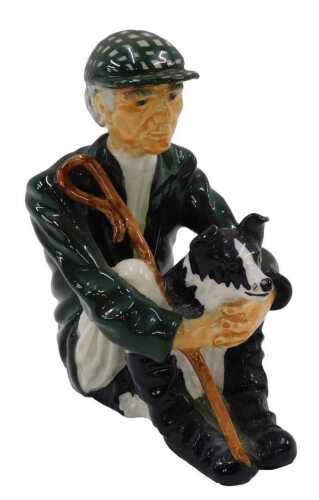 A Shebeg Isle of Man J Firth figure of a shepherd and sheep dog, 14cm high.