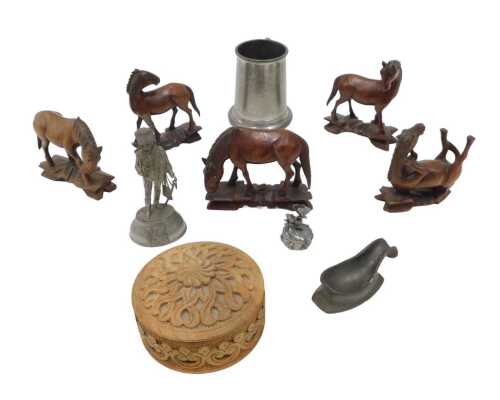 A set of various Tang style carved wooden horse figures, each on shaped bases, to include one...