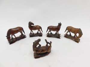 A set of various Tang style carved wooden horse figures, each on shaped bases, to include one... - 2
