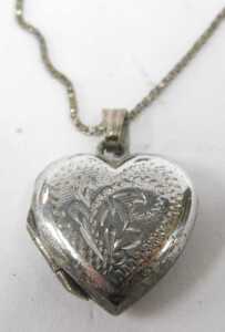 A group of silver chains and pendants, mainly religion related to include St Christopher,... - 2