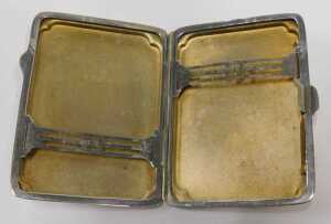 A George V silver cigarette or card case, of oblong form, with engine turned body and silver... - 3