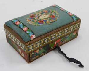 A 20thC cloisonne box, of oblong form, with domed lid, profusely decorated with flowering shrubs,... - 10
