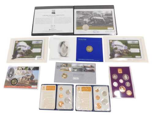 Various cased commemorative coins, to include a Millennium coin set, 1970 GB coin set, cased...