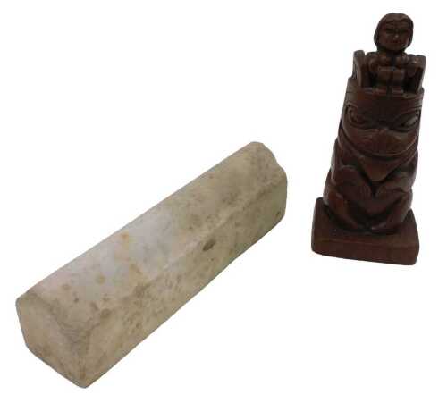 A Sharman's British Columbia Canada carved Inuit style totem figure, on oblong base, labelled...