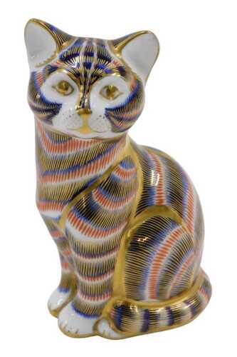 A Royal Crown Derby paperweight ornament cat standing, in Imari style colours with gilt...