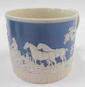 An Inuit carving, of a gentleman seated, unsigned, a 19thC Staffordshire pottery mug, raised... - 2