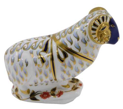 A Royal Crown Derby paperweight ornament of a ram, with silver stopper, 14cm high.