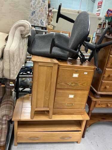 V - A two drawer oak filing cabinet, office chair, lightwood television stand, and a side cabinet....