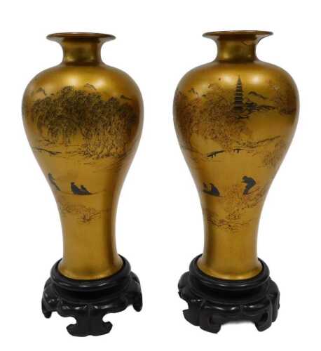 A pair of papier mache style gilt coloured Chinese vases, each of inverted shouldered circular...