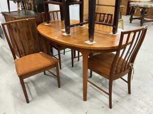 A teak extending dining table in the G-Plan style, comprising D end table, and four chairs,...