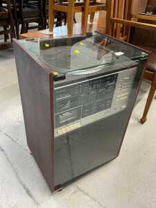 A stacking system, comprising Alba turntable in part cabinet.