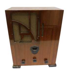 A mid 20thC walnut cased Ultra radio, on squat feet, 46cm high. WARNING! This lot contains...