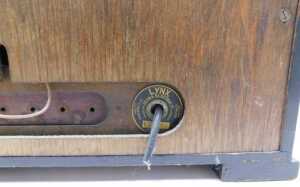 A mid 20thC walnut cased Ultra radio, on squat feet, 46cm high. WARNING! This lot contains... - 5