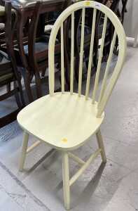 A cream painted hoop back dining chair.