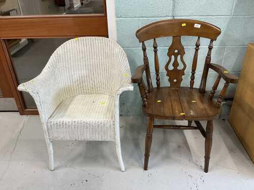 A carver chair and a Lloyd loom style chair. (2)