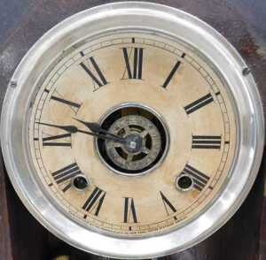 A late 19thC oak cased American gingerbread clock, the 13cm diameter Roman numeric dial marked... - 6