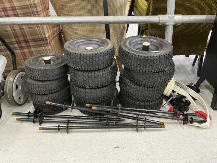 V - Various trolley or ride on mower wheels, with accessories. (a quantity) Note: VAT is payable on...