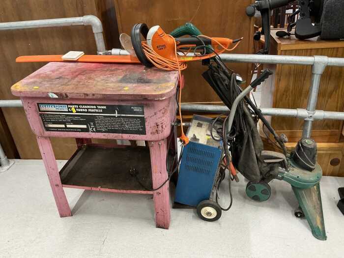 A Coopers 102 DB electric garden leaf vacuum, various other tools, workbench, Boost starter...