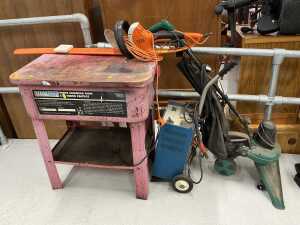 A Coopers 102 DB electric garden leaf vacuum, various other tools, workbench, Boost starter...