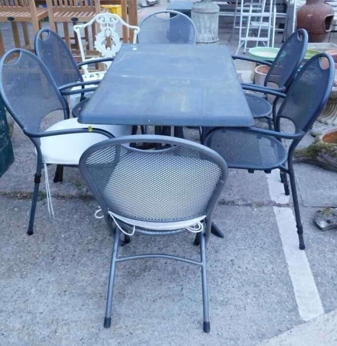 A patio bistro suite, comprising rectangular table, six various chairs, and a further white...