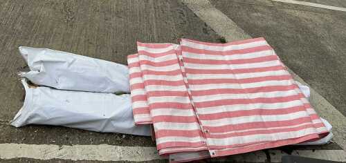 Various red and white striped market stall-type tarpaulin, etc.