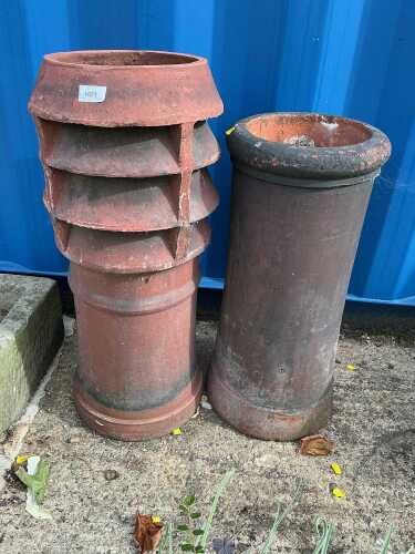 A fire clay chimney pot, and another smaller.