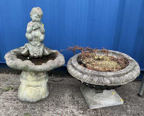 A rococo design concrete birdbath, set with satyr above shell shaped opening, on shaped base,...