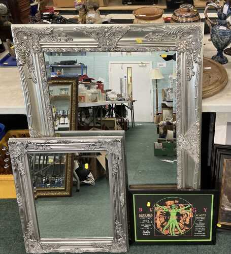 V - A rectangular mirror, with bevelled glass and silver frame, a reproduction Biology October 21st...