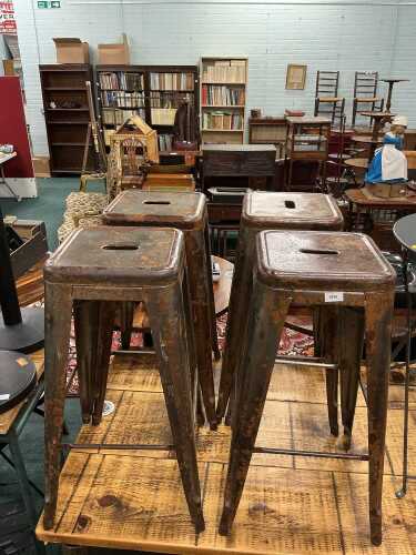 V - Four iron industrial style pub bar stools. (4) Note VAT is payable on the hammer price of this...