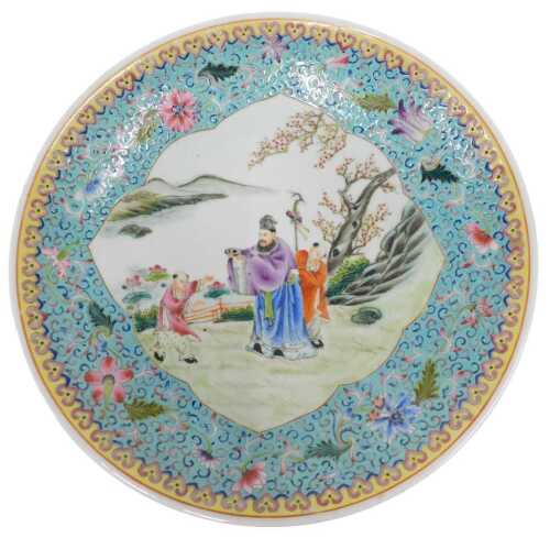 A Chinese Republican famille rose porcelain charger, the border profusely decorated with flowers...